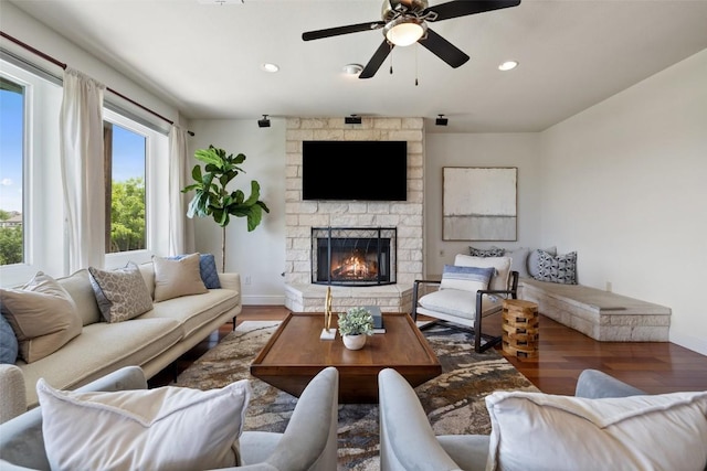 10709 Pointe View Dr, Austin, TX 78738 - living area with wood finished floors, a ceiling fan, a fireplace, and recessed lighting