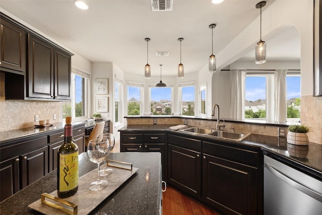 kitchen with recessed lighting, visible vents, stainless steel dishwasher, and a sink