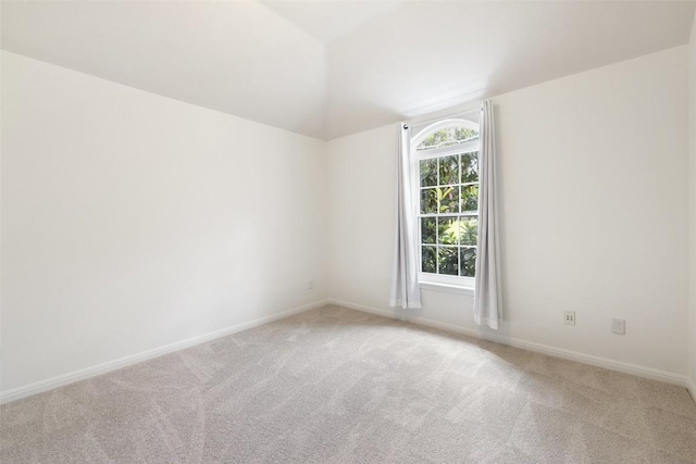 10709 Pointe View Dr, Austin, TX 78738 - unfurnished room featuring light carpet and vaulted ceiling