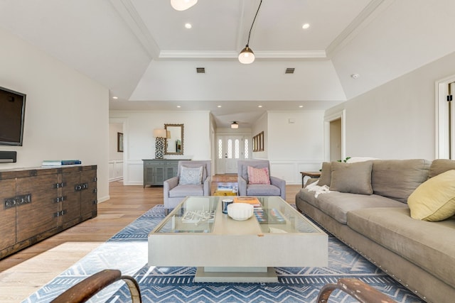 living room with ornamental molding, high vaulted ceiling, and light hardwood / wood-style floors