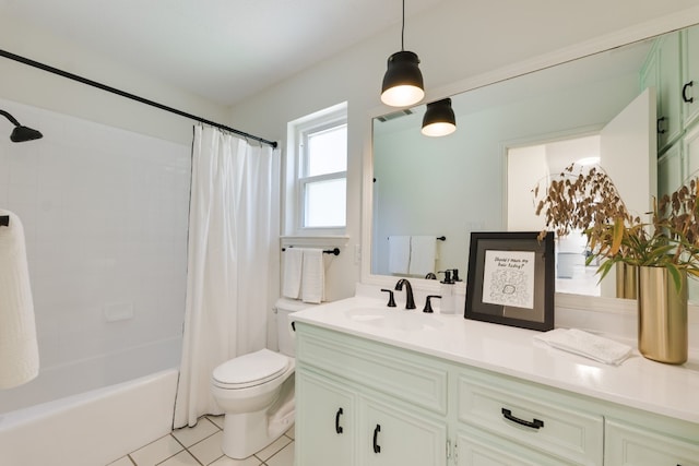 full bathroom featuring vanity, tile patterned floors, shower / bath combination with curtain, and toilet