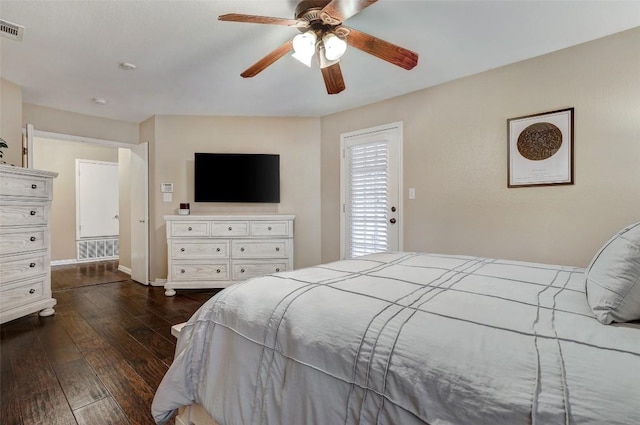 bedroom featuring dark hardwood / wood-style floors and ceiling fan