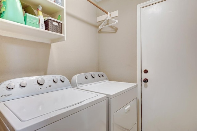 washroom with washer and clothes dryer