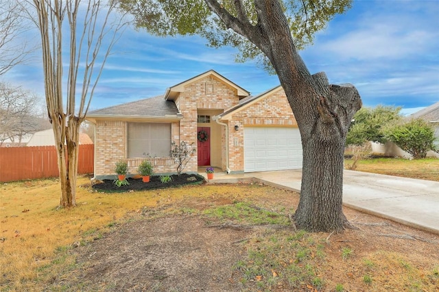 ranch-style house with a garage and a front lawn