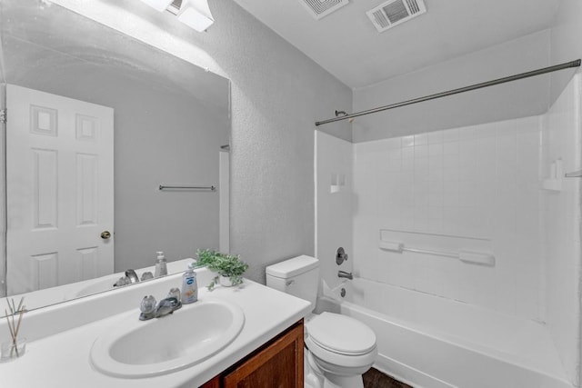 full bathroom featuring vanity, bathtub / shower combination, and toilet