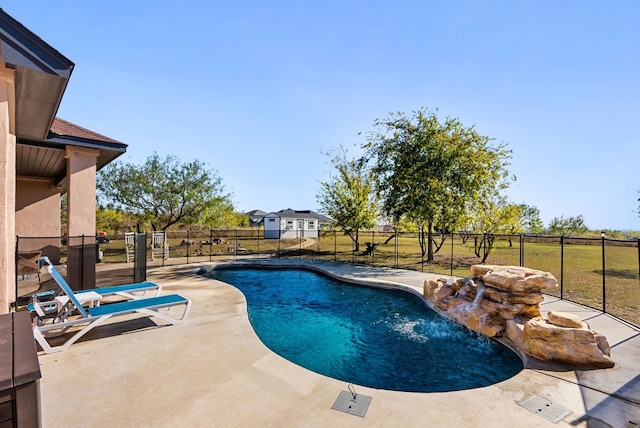 view of pool featuring a patio and pool water feature