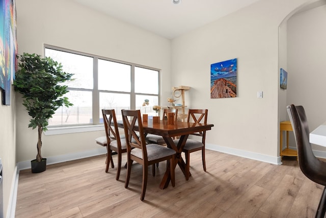 dining area with light wood-type flooring