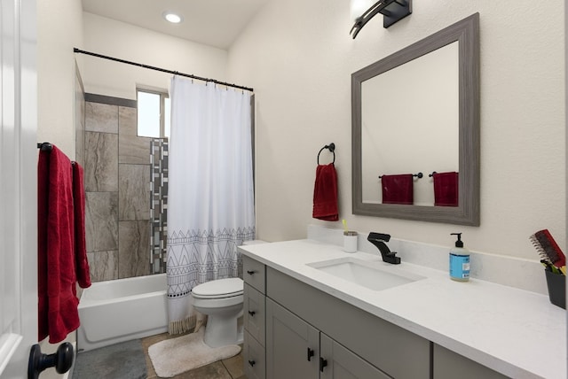 full bathroom with vanity, toilet, and shower / bath combo