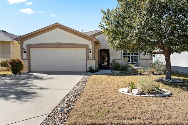 single story home with a garage