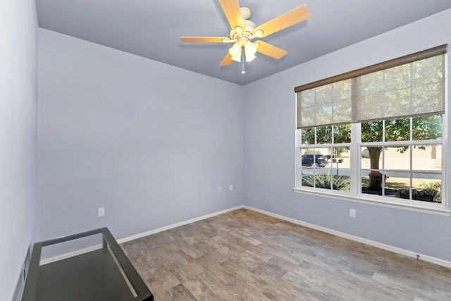 unfurnished room featuring wood-type flooring and ceiling fan