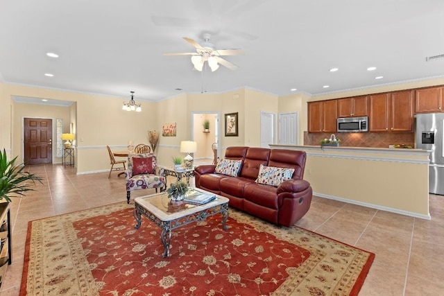 living room with light tile patterned flooring and ceiling fan with notable chandelier