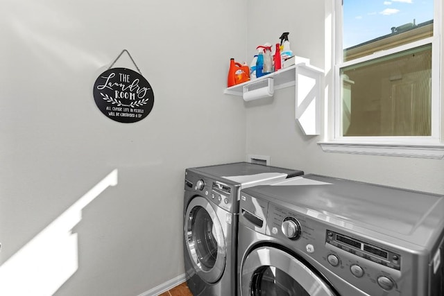 washroom featuring independent washer and dryer