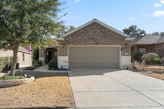 ranch-style home featuring a garage