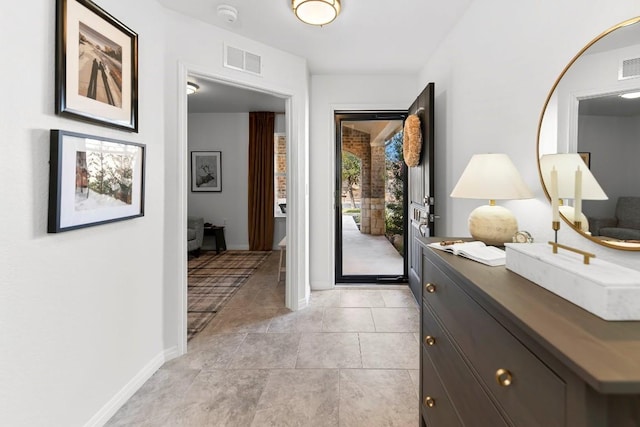 interior space featuring light tile patterned floors