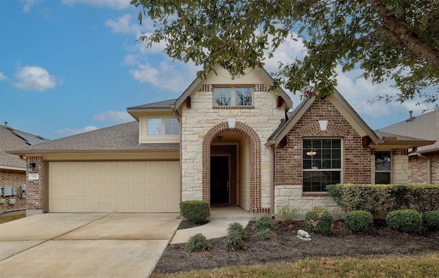 view of front of property with a garage