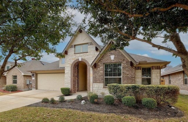 view of front of property with a garage