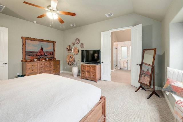 carpeted bedroom with vaulted ceiling and ceiling fan