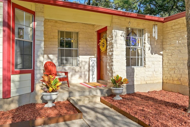 property entrance with a porch