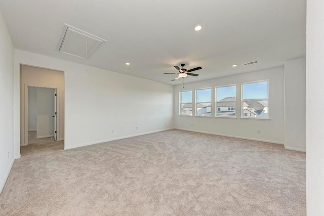 empty room with light carpet and ceiling fan