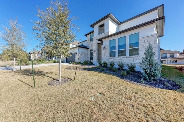 view of front of property with a front yard