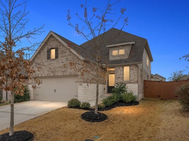 view of front of home featuring a garage