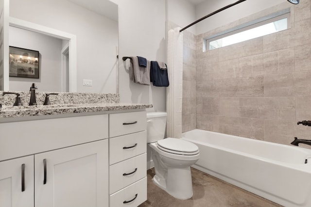 full bathroom with vanity, toilet, and shower / bath combo with shower curtain