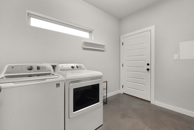 laundry room featuring washer and clothes dryer