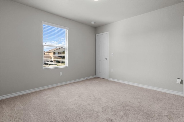 empty room with carpet flooring