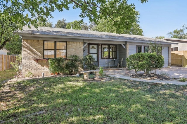 ranch-style home featuring a front yard