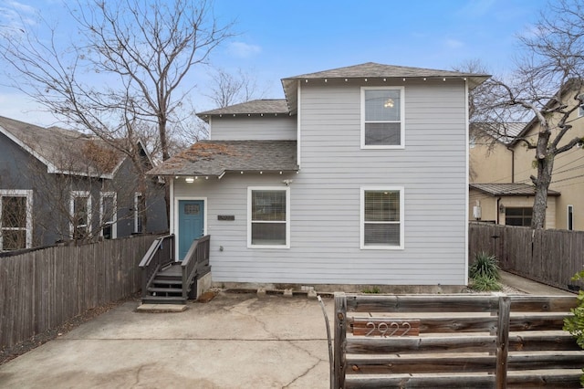 rear view of house featuring a patio