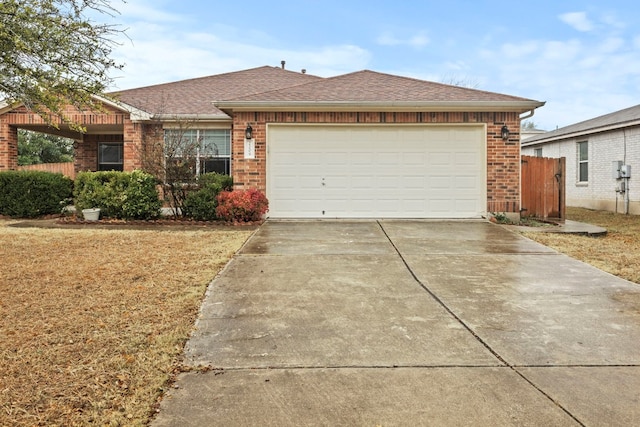 ranch-style house featuring a garage