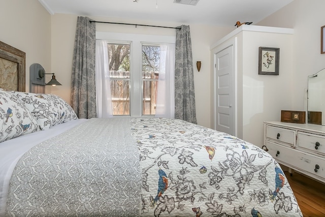 bedroom with wood-type flooring