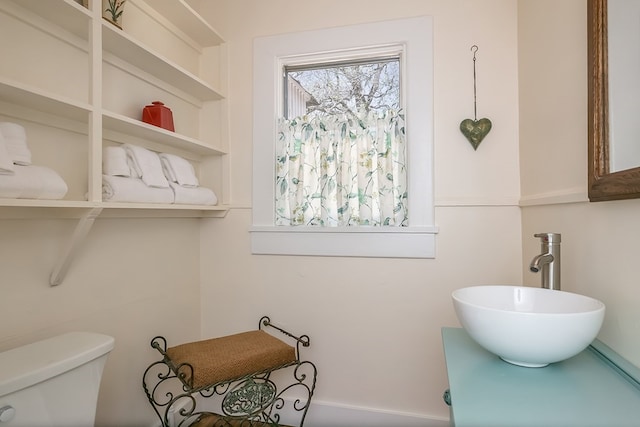 bathroom featuring sink and toilet