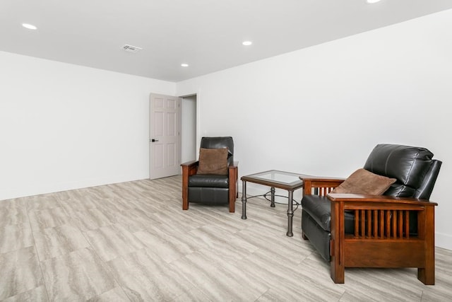 sitting room featuring light wood-type flooring