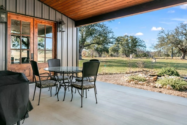 view of patio with a grill and french doors