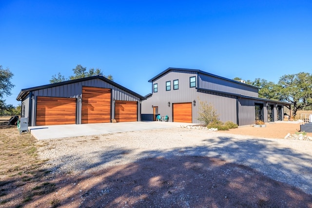 view of side of property with an outbuilding