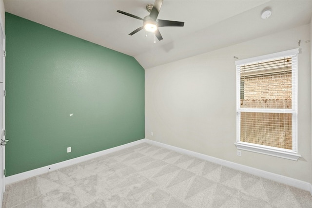 259 N Sage Holw, Dripping Springs, TX 78620 - empty room featuring light colored carpet, ceiling fan, vaulted ceiling, a smoke detector, and baseboards