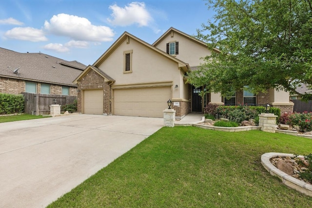 259 N Sage Holw, Dripping Springs, TX 78620 - view of front of house featuring brick siding, driveway, a garage, and stucco siding