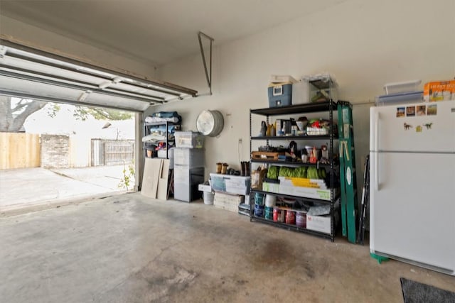 garage with white fridge