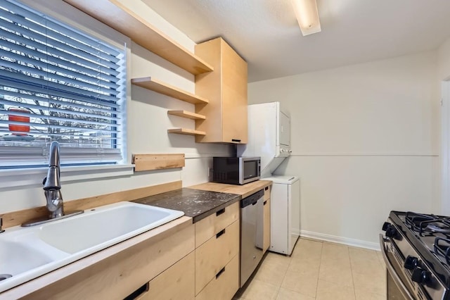 kitchen featuring appliances with stainless steel finishes and sink