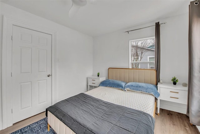 bedroom with light wood-type flooring