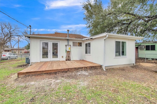 back of house featuring french doors