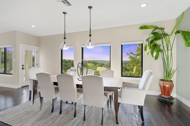 dining area featuring recessed lighting, wood finished floors, visible vents, and baseboards