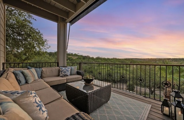 wooden deck featuring outdoor lounge area