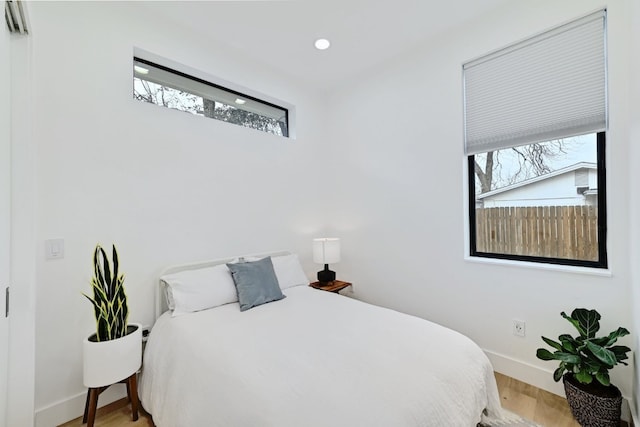 bedroom featuring light wood-type flooring