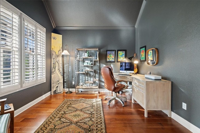 office with dark wood-type flooring, ornamental molding, and baseboards