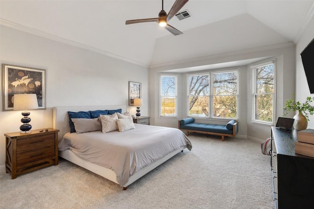 bedroom with lofted ceiling, ornamental molding, visible vents, and light colored carpet