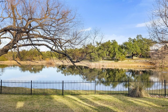 view of water feature with fence