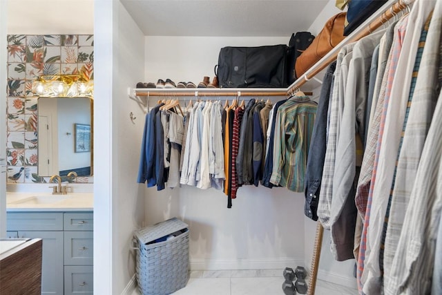 spacious closet with a sink