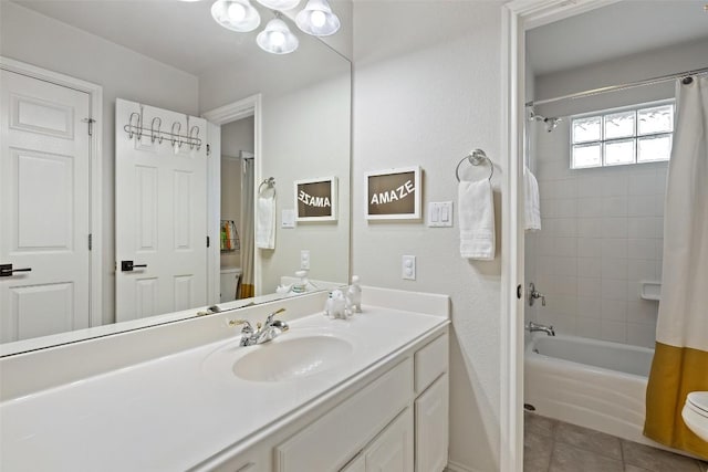 full bathroom featuring toilet, a chandelier, shower / tub combo, tile patterned flooring, and vanity